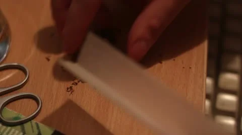 Rolling a joint _4 Stock Footage 11434553