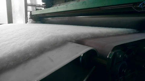 Rolling machine works with polyester material at a factory. Video stock 109963353