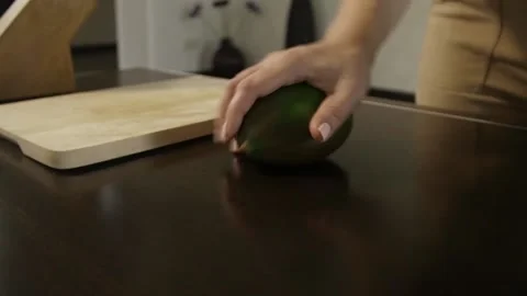 Rolling mango on the table Stock Footage 140600205