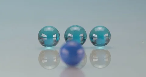 Rolling marbles close up footage Stock Footage 115075019