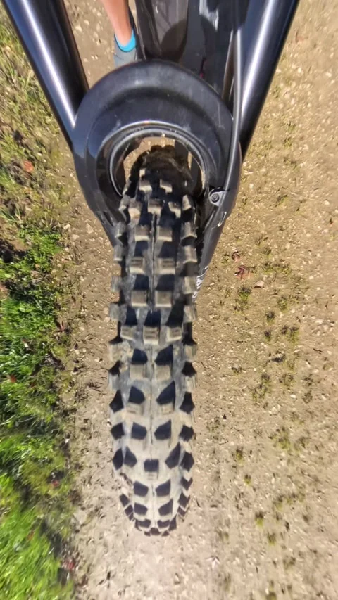 Rolling mountain bike wheel Stock Footage 290427924