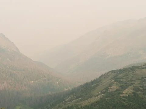 Rolling mountain hills create layers of depth in a Rocky Mountain landscape i Stock Photos