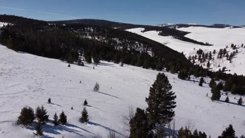 Rolling mountainous hills in winter Stock-Footage 312030132