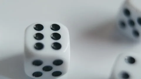 Rolling of Multiple White Dice on White Surface Stock Footage 331915474