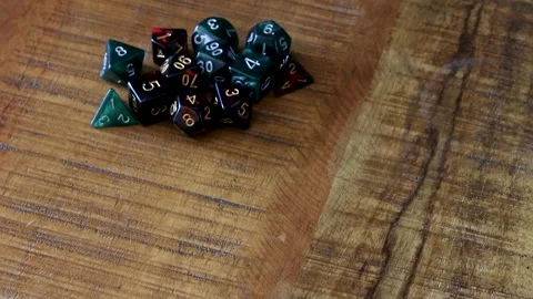 Rolling a natural 20 on a D20 dice Stock Footage 335944407