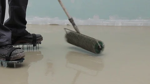 Rolling with needle roller on self leveling screed Stock Footage 111939062