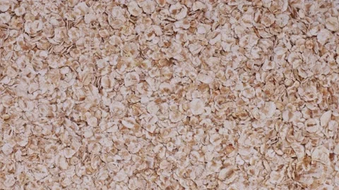 Rolling oatmeal close-up slow mo Stock Footage 146704839