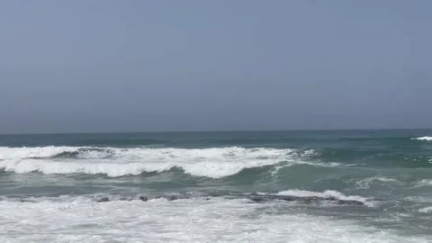 Rolling Ocean Waves Breaking in Layers with White Foam Stock Footage 340775138