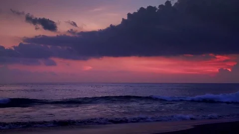 Rolling ocean waves breaking on shore in twilight. Perfect vacation at Bali Stock-Footage 73125064