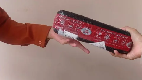 Rolling orange in front of two oranges Stock Footage 146257085