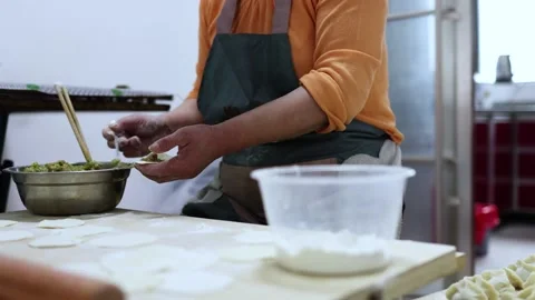 Rolling out bread dumplings Stock Footage 196536026