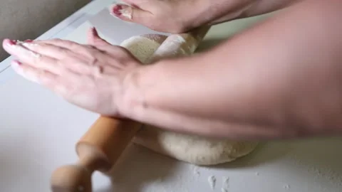 Rolling out cake dough. Sprinkle flour and  for cakes. Stock Footage 298335223