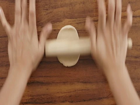 Rolling out the Chapathi - Indian Flat Bread Stock Footage
