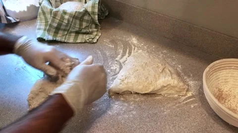 Rolling Out Dough to Bake Bread During Covid19 Stock Footage 134215156
