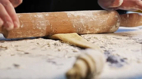 Rolling out dough for croissants Stock Footage 149084369