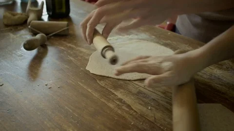 Rolling out dough Stock Footage 76796683
