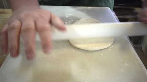 Rolling out dough by hand Video stock 321827915
