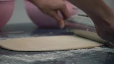 Rolling Out Dough in the Kitchen Stock Footage 317472565