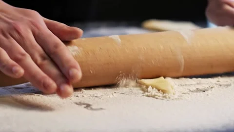 Rolling out dough in process of making croissants Stock Footage 148728364
