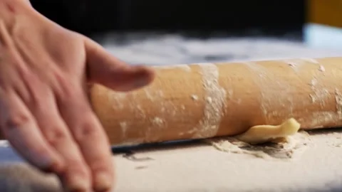 Rolling out dough in process of making croissants Stock Footage 148793341