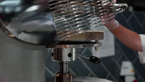 Rolling out the dough with a specialized press machine. Pizza Dough Preparat Stock Footage 203015949
