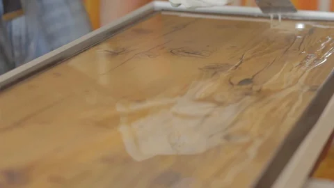 Rolling Out Epoxy Resin, Lateral Shot Video stock 89773874