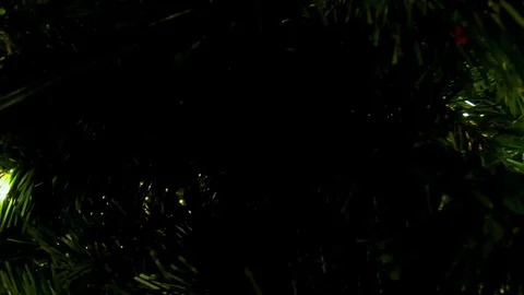Rolling out from inside the Christmas tree, revealing the beauty of the Stock Footage 100054027