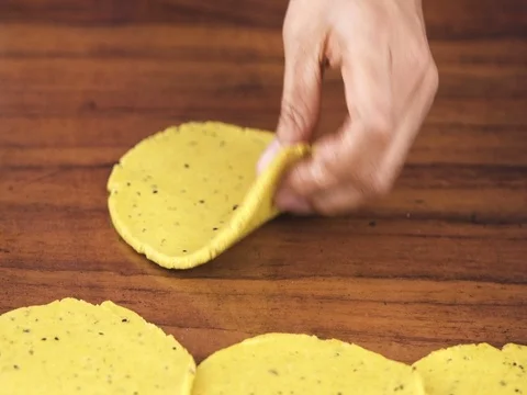 Rolling Out a Roti using Indian Style Rolling Pin 動画素材 80418588