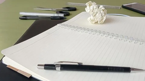A rolling paper on the stationary in the workplace Stock Footage 150523540