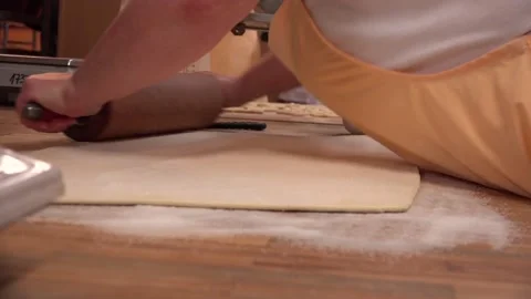 Rolling Pin and Dough being rolled Stock Footage 239693730