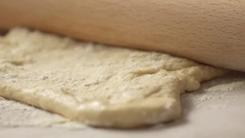 Rolling Pin Flattening Dough. Stock Footage 263363869