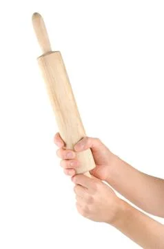 Rolling pin in a human arm Stock Photos