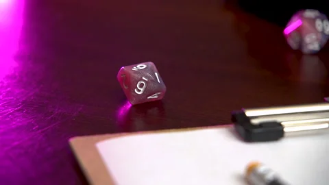Rolling pink 10 sided dice Stock Footage 201496417
