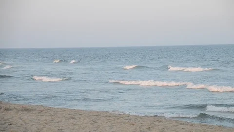 Rolling pink ocean waves at beach during sunset 2 Video stock 94821022