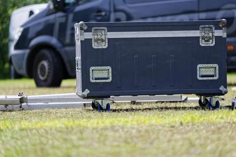 Rolling plastic flight case with metal frame and latches Stock Photos