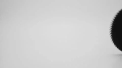 Rolling plastic gears in white and black, isolated on a white background. Stock Footage 111534934