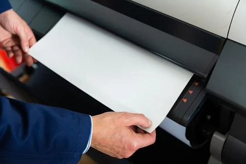 Rolling plotter printer in work Stock Photos