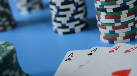 Rolling red dice on background of chips and cards. Stock Footage 22007523