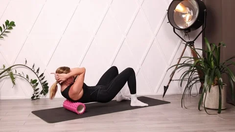 Rolling with a roller for the back Stock Footage 280160355