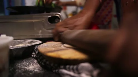 Rolling Roti dough Stock Footage 65787977