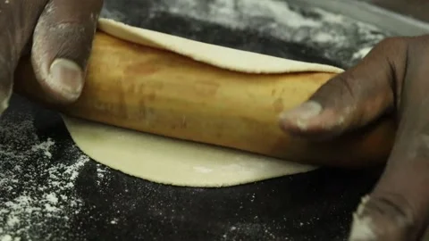 Rolling Round Circular Indian Roti Or Fulka Bread From Wheat Flour Dough Stock Footage 146810942