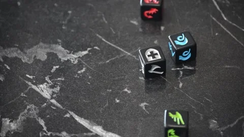 Rolling RPG board game dice on a black marble table Stock Footage 130462729