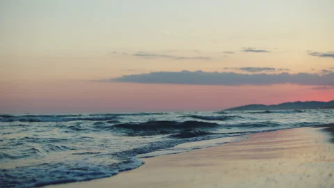 Rolling sea waves on sandy beach Stock Footage 155911648