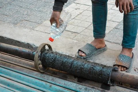 Rolling shutter spring unit repair and cleaning service Stock Photos