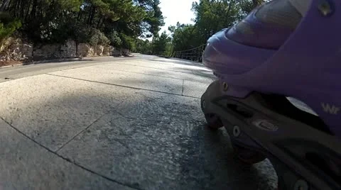 Rolling skate on the pavement Video stock 12548979