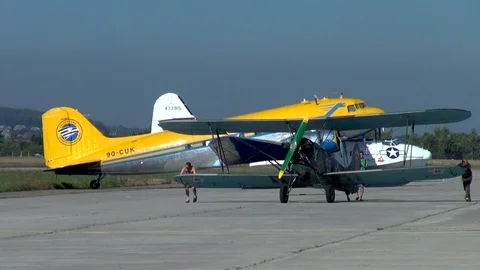 Rolling Soviet multi-purpose biplane U-2 / Po-2 NATO: mule in parking lot. Stock Footage 120778717