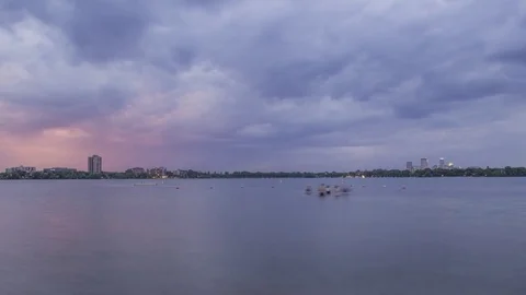 Rolling Storm Clouds over Minneapolis' Bde Maka Ska Lake Stock Footage 81145465