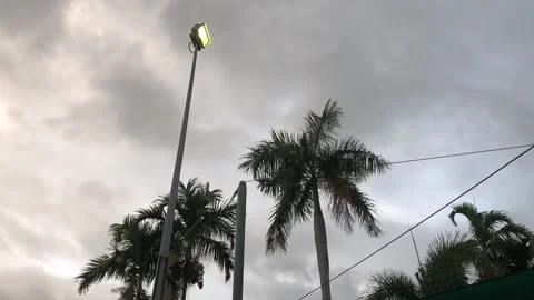 Rolling Storm over street light Stock Footage 143617957