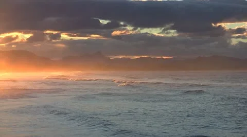 Rolling surf at sunset Byron Bay, Australia Stock Footage 11348443