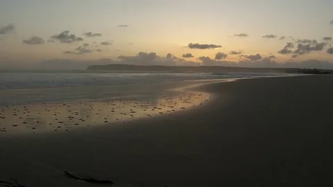 Rolling surf at sunset Stock Footage 78883820